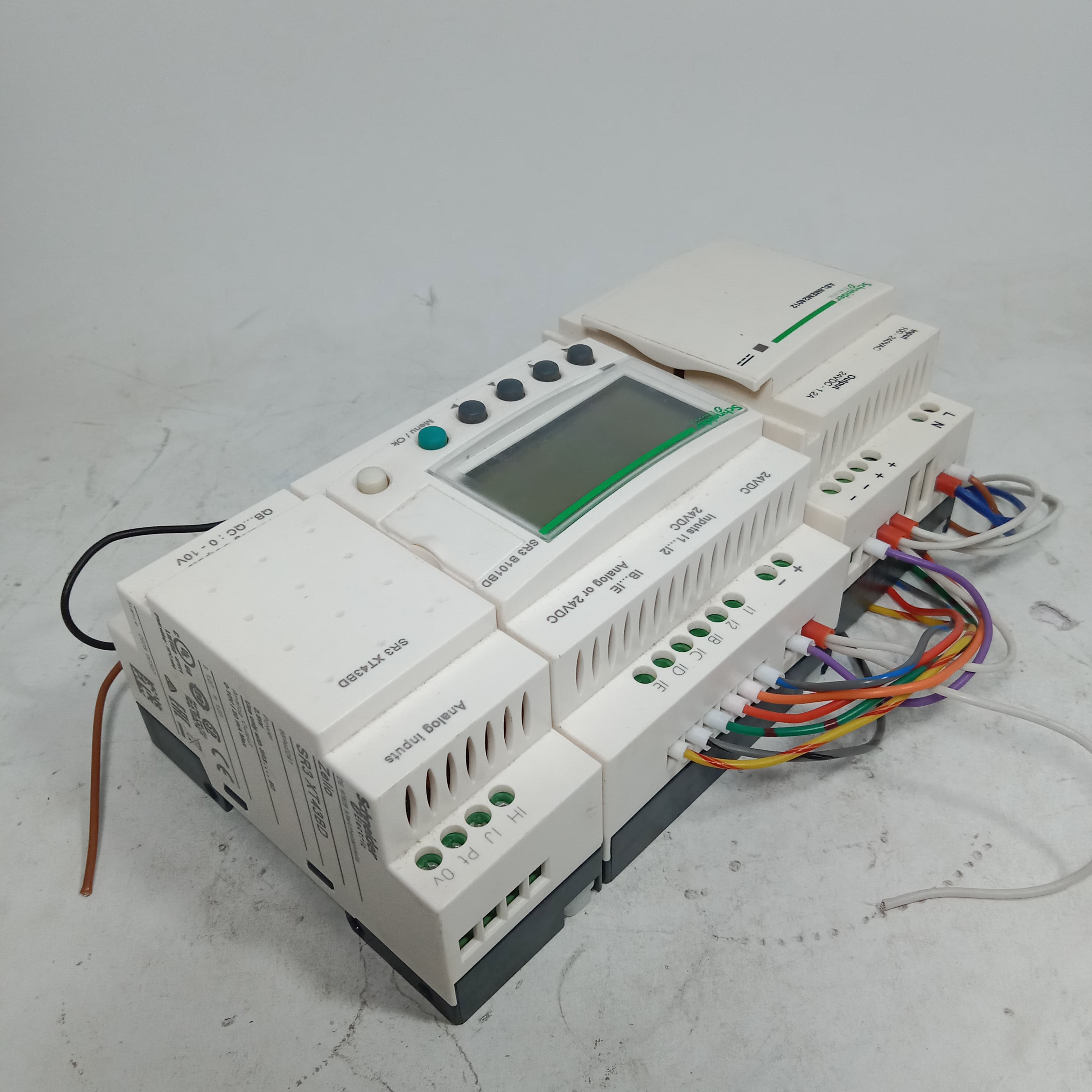 Schneider SR3 B101BD Programmable Logic Controller Module + ABL8MEM24D12 Regulated switch Power Supply in  pakistan thumbnail 7